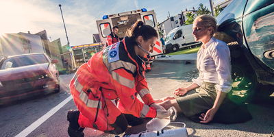 medical aid helping woman